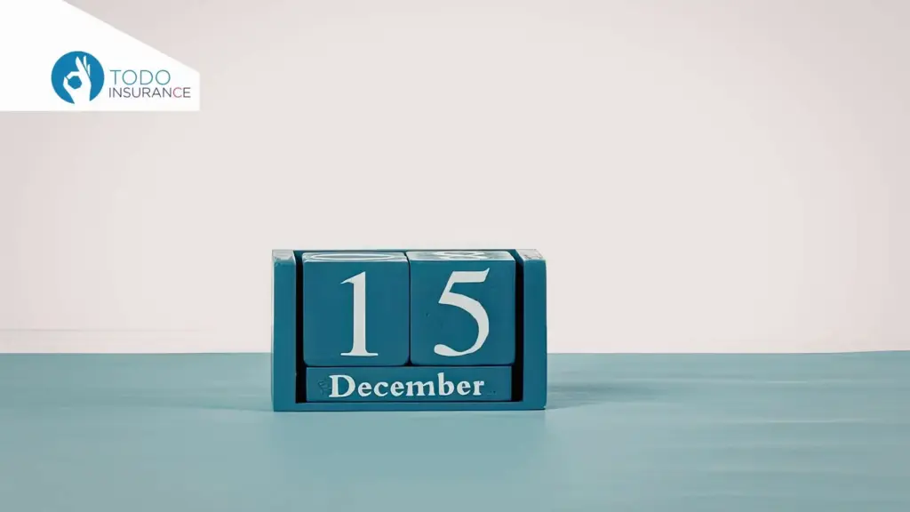 fecha en un calendario de cubos que marca el 15 de diciemnre periodo de inscripción del obama care todo insurance