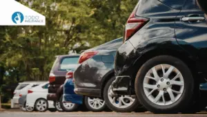 "A parking lot with several vehicles and trees in the background Complete Guide to Auto Insurance in the United States todo insurance
